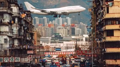A plane taking off in Kowloon, Hong Kong.